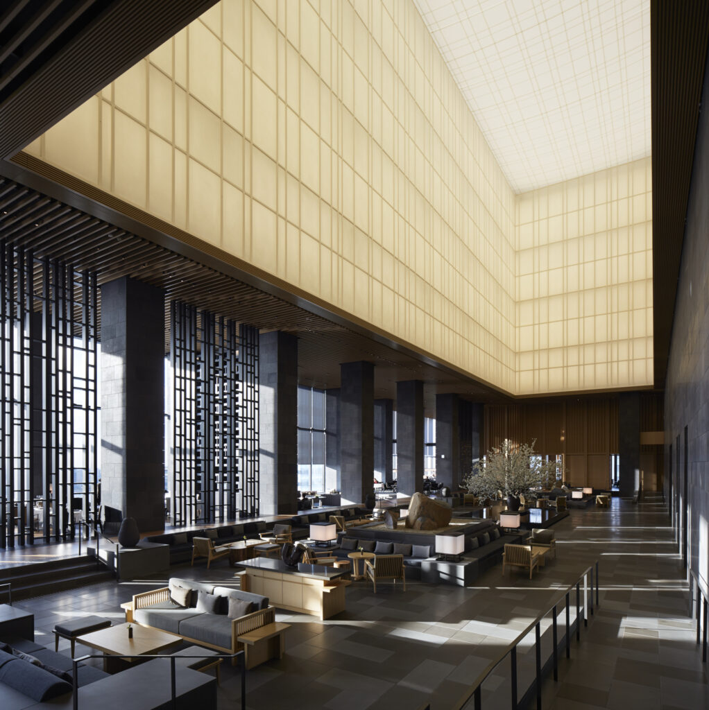 Hongye Furniture Group Co., Ltd | Hotel Lobby Furniture Psychology: Why Chairs Look Weird (2026)The soaring lobby rises nearly 30m.