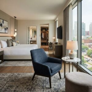 Luxury Blue Velvet Armchair in Hotel Bedroom Suite