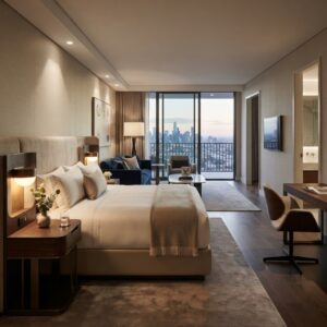 Luxury hotel bedroom furniture showcasing a matching wooden side table and nightstand setup